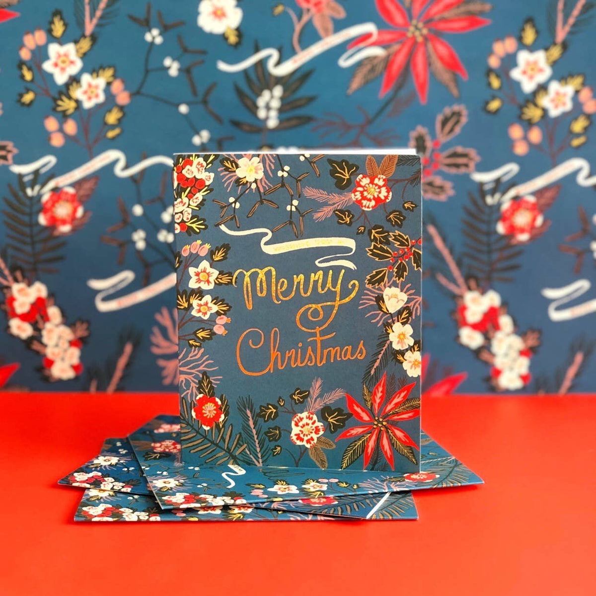Red Cap Cards - Blue Poinsettia holiday wrapping paper: Rolls of 3 sheets