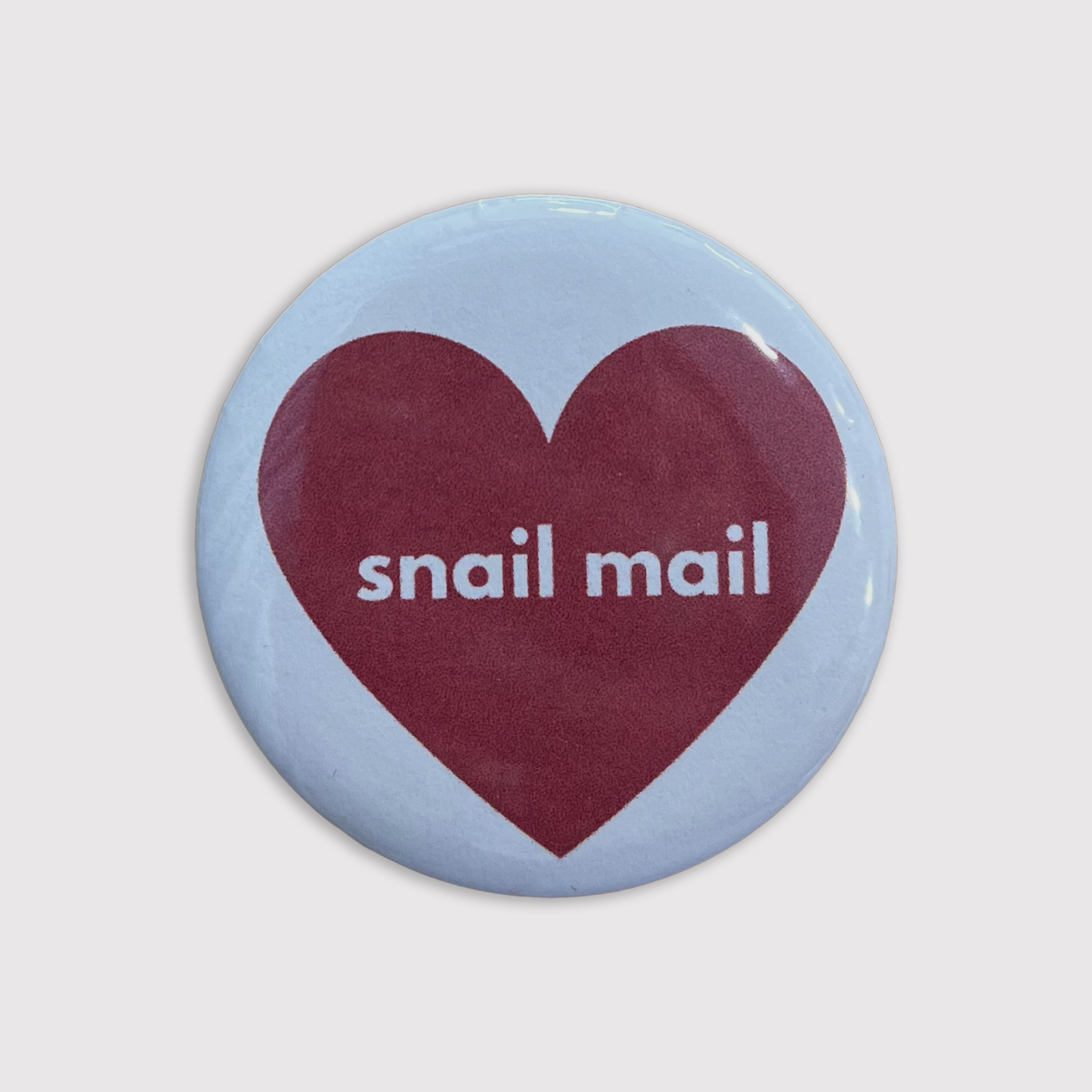 Snail Mail heart button