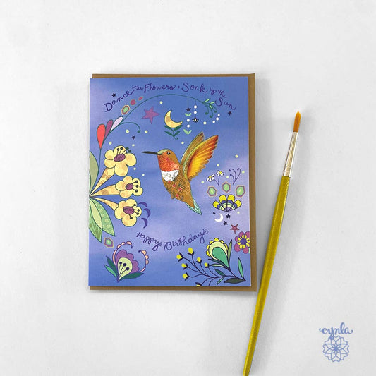 Cynla - Hummingbird Dance Birthday Card - orange bird flower garden